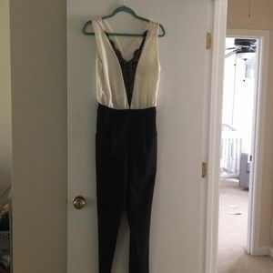 One piece black and white jumpsuit, hardly worn!